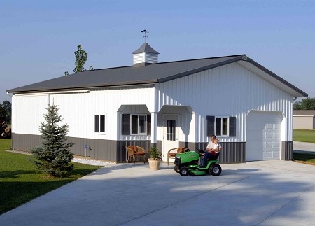 Post-frame garage with charcoal and white metal wall panels